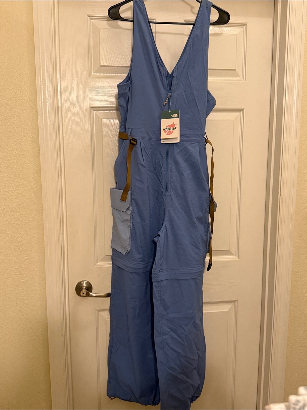 The North Face Blue One-Piec with Tan Straps and zip off pants